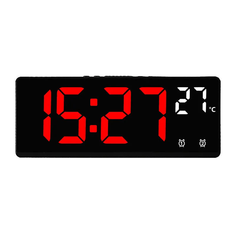 Electronic alarm clock with large LED screen showing time and temperature on desktop