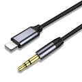 Silver nylon-braided 3.5mm audio cable with connectors on a plain background.