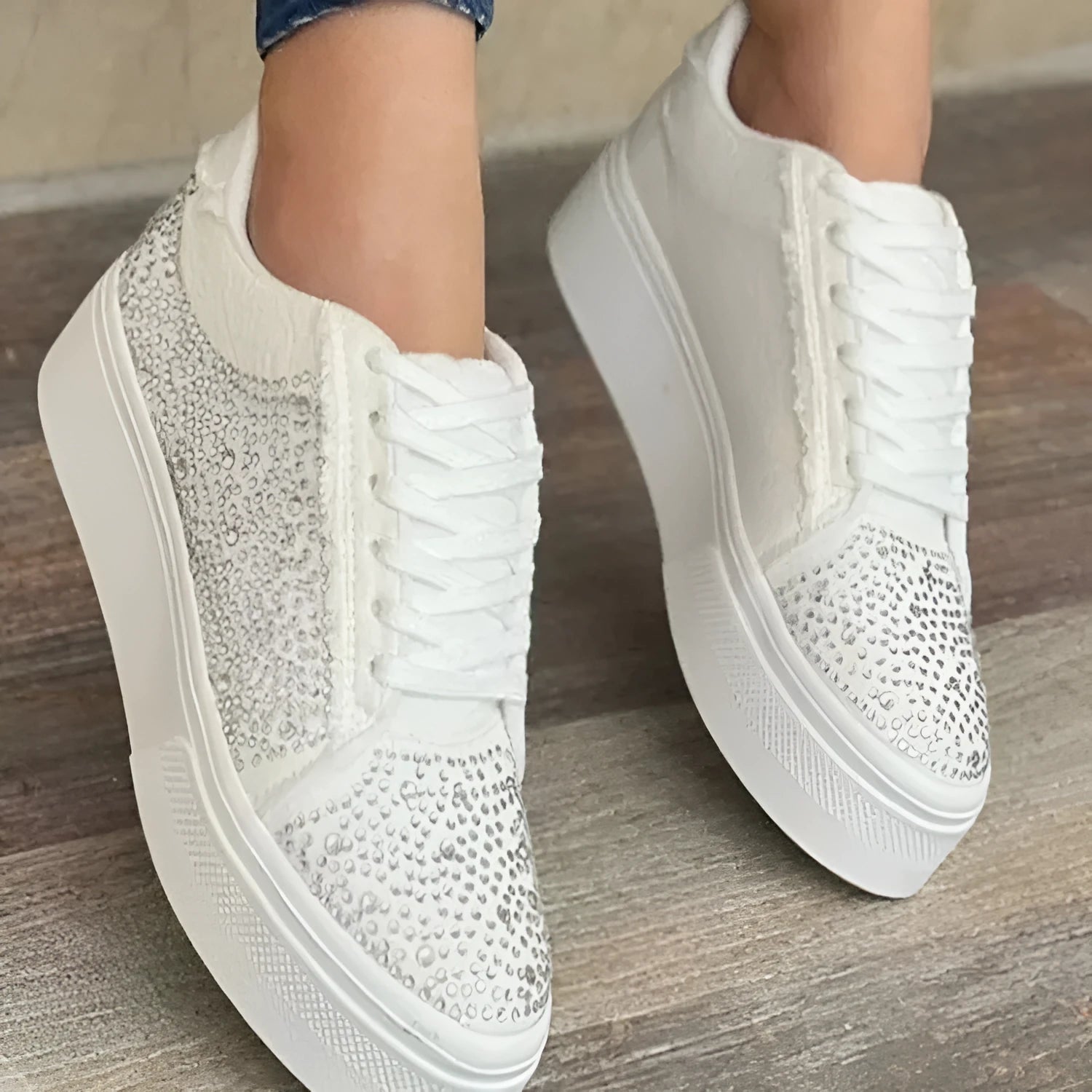 Plus size women's black lace-up casual shoes with rhinestone details and a thick rubber sole.
