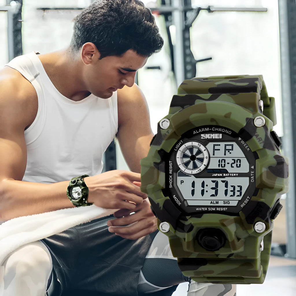 Digital sport watch with round dial, plastic strap, showing GMT display, in army green colour option.