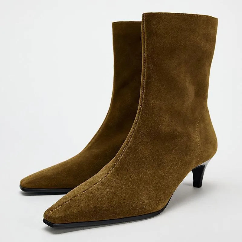 Brown square toe high heel ankle boots with a side zip and a stiletto kitten heel.