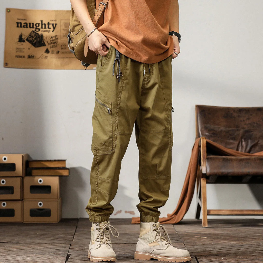 Men's tapered harem trousers in cotton with banded ankle and elastic waist in solid colour options.