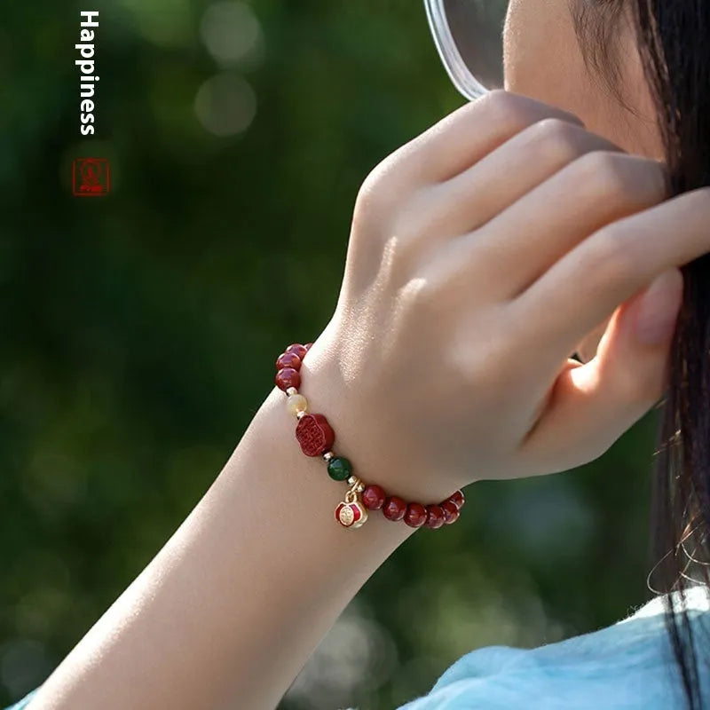Emperor sandstone Fu character bracelet with happy eyebrow pattern in 6mm or 8mm cinnabar bead sizes