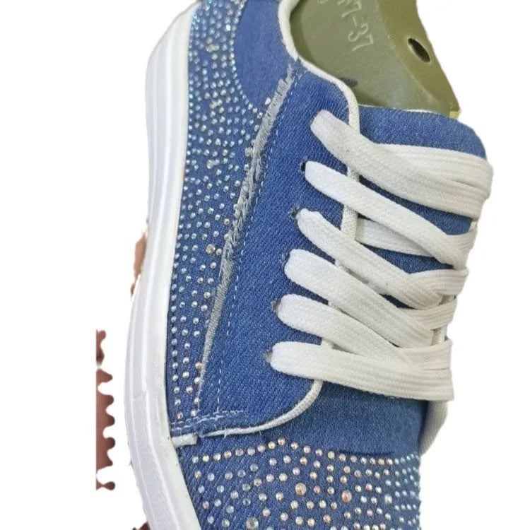 Plus size women's black lace-up casual shoes with rhinestone details and a thick rubber sole.