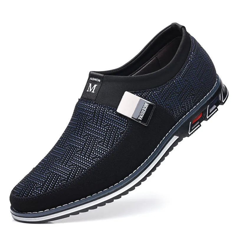 Men's grey and white low-top casual shoes with a square toe and flat rubber sole.