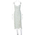 Women's long lace floral print dress with front slit and suspender straps in blue.
