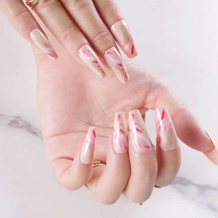 Wearable manicure set showing 24 artificial nails with rose, tulip, leopard and XINGX designs