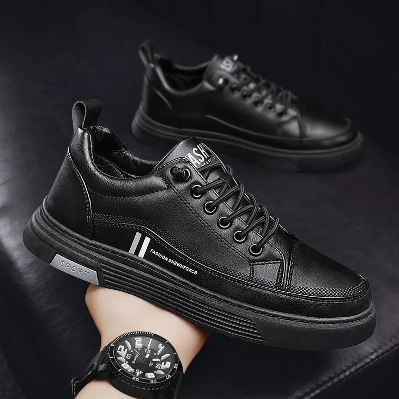 Men's white skate shoes with elastic band closure and low-top design showing stitching details