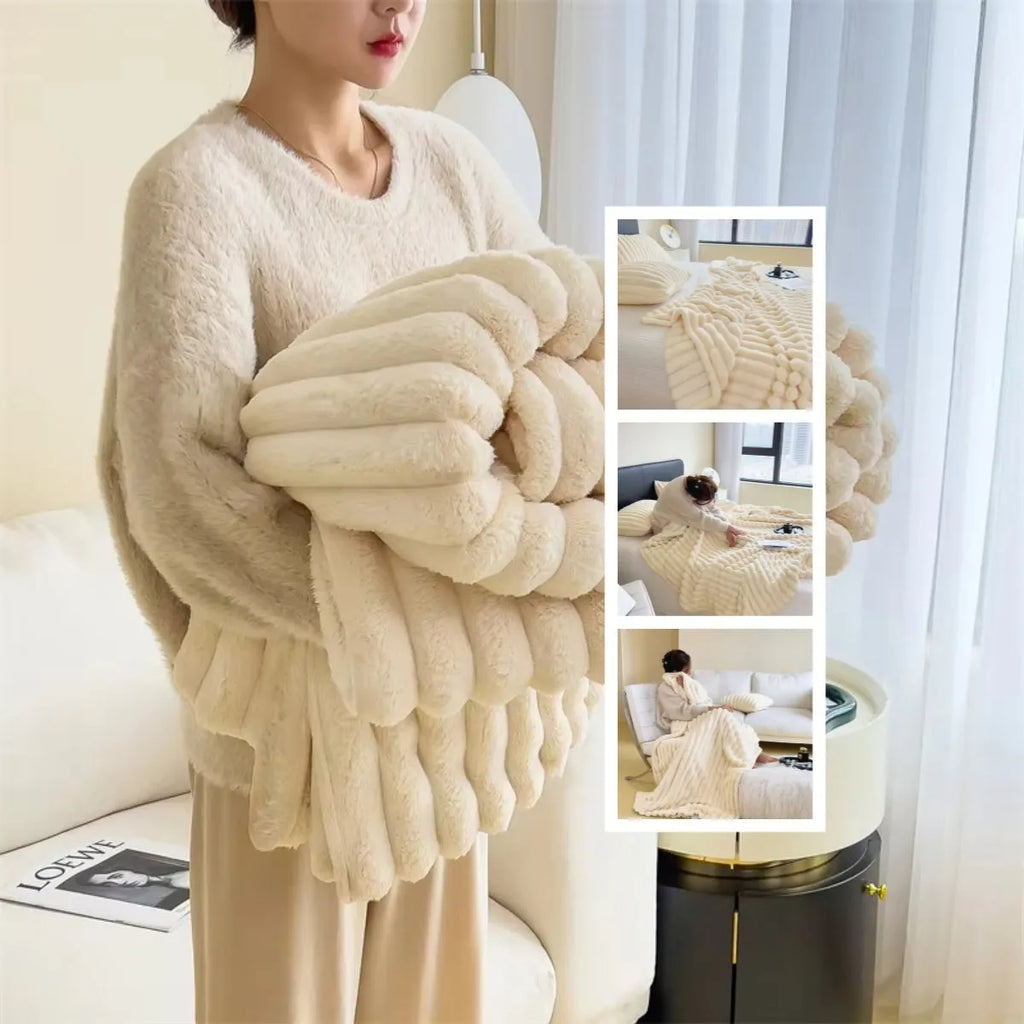 Soft Wind bubble velvet faux rabbit fur blanket in a solid colour, shown folded.