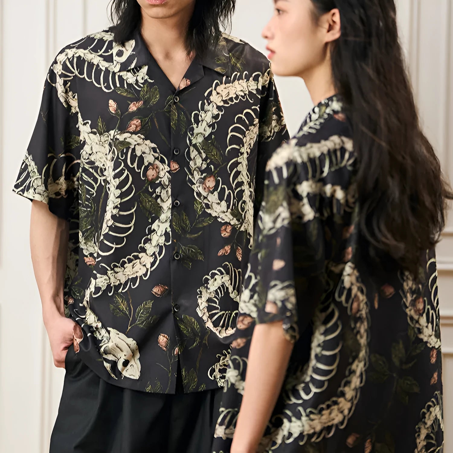 Men's loose fit short sleeve shirt with snake bone floral print and a Cuban collar.