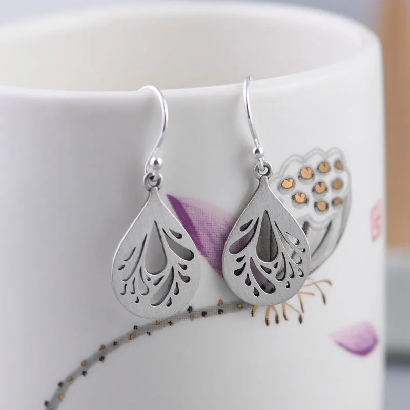 Retro hollow water drops earrings in 925 sterling silver with drop shape design