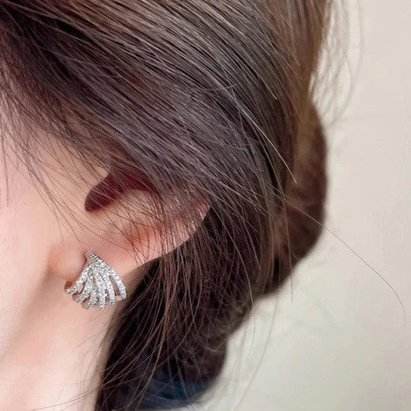 Geometric line design earrings with zircon stones in platinum colour electroplated finish