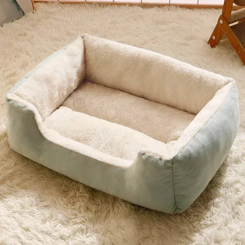Short plush pet cushion bed for cats and dogs in grey colour, shown in L size 60x45 cm.