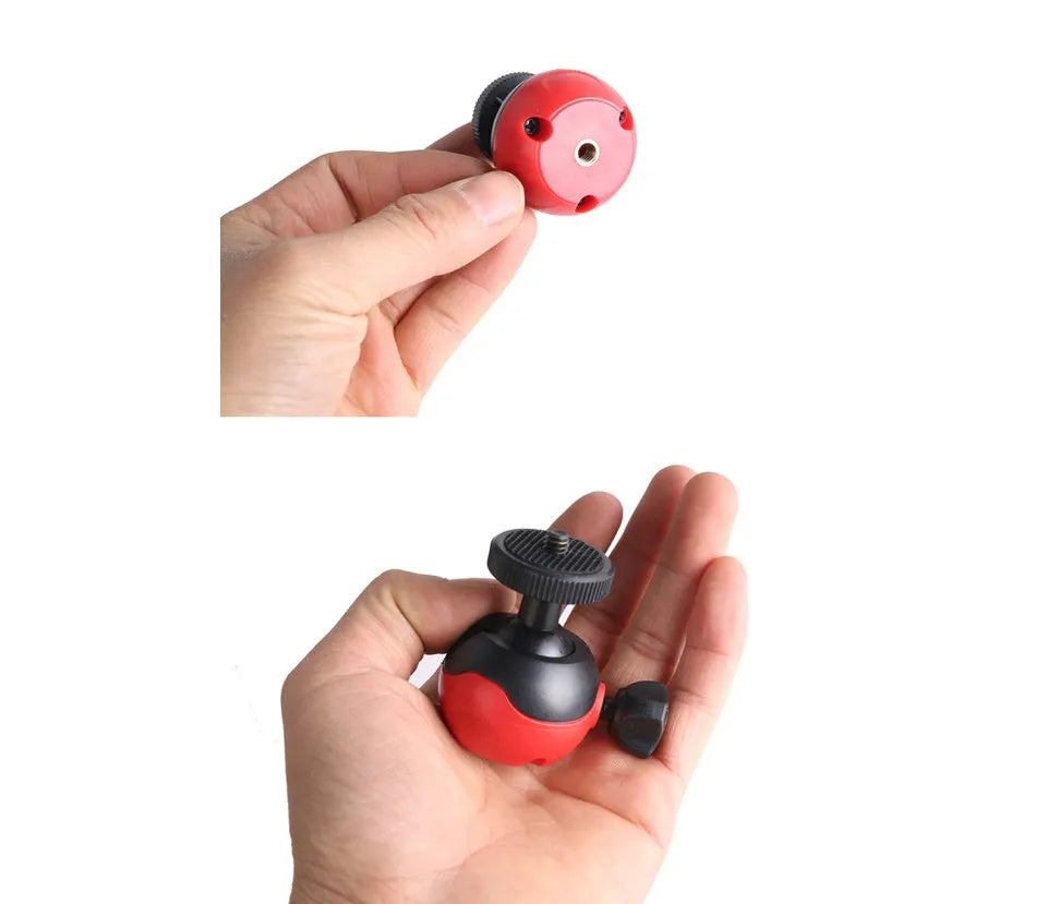 Black octopus tripod stand with flexible rubber legs and a spherical gimbal head for cameras and phones.