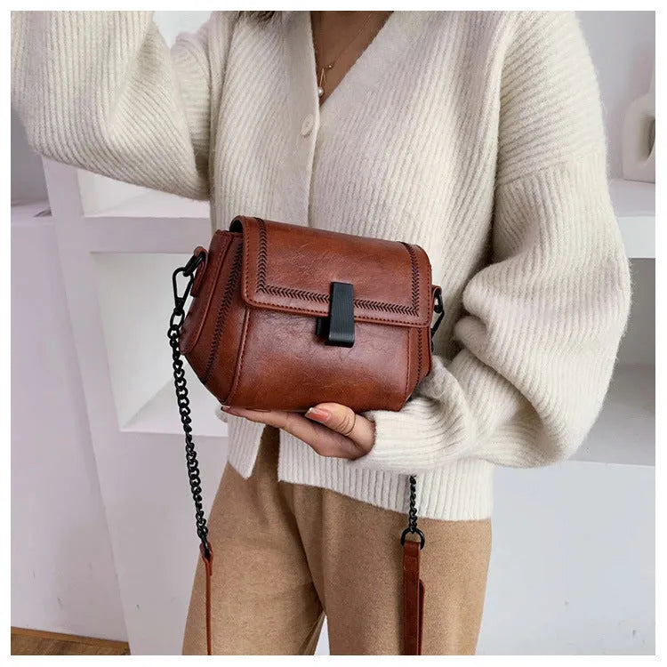 Korean-style PU shoulder crossbody bag in beige with clamshell opening and horizontal square shape