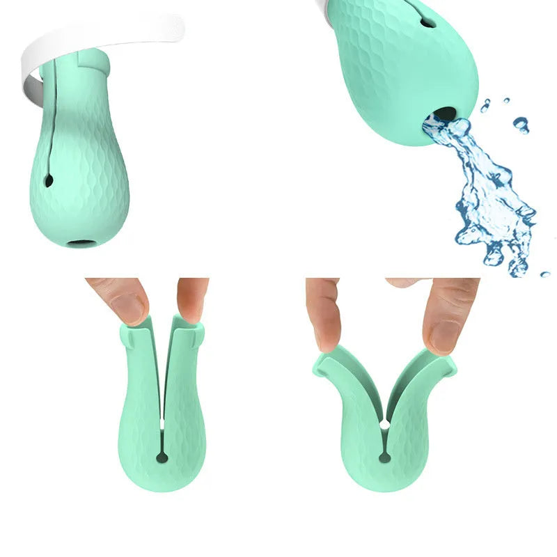 Four green silicone cat anti-scratch foot covers for pet handling protection