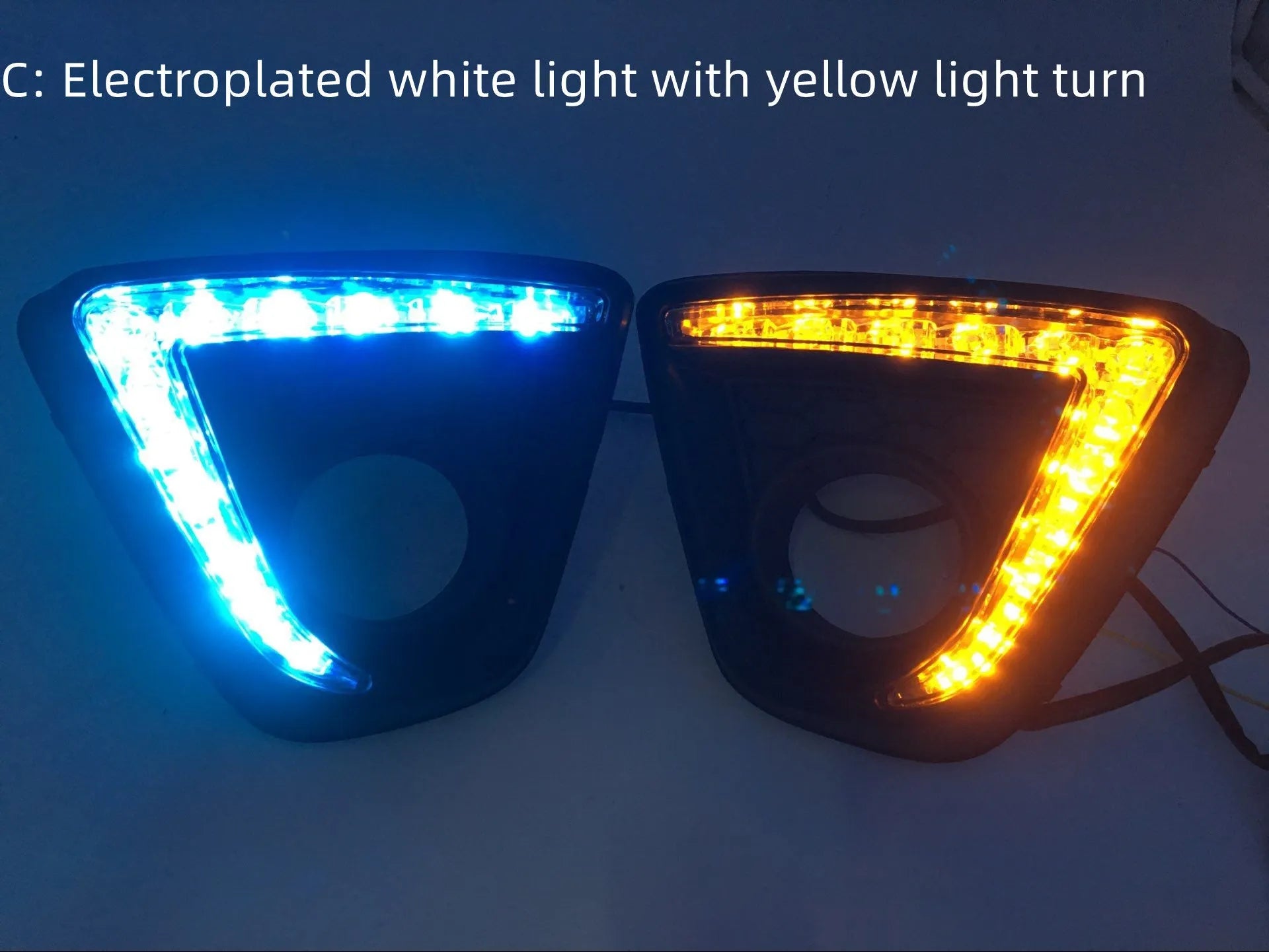 Set of two silver electroplated daytime running light units for a Mazda CX-5 car.