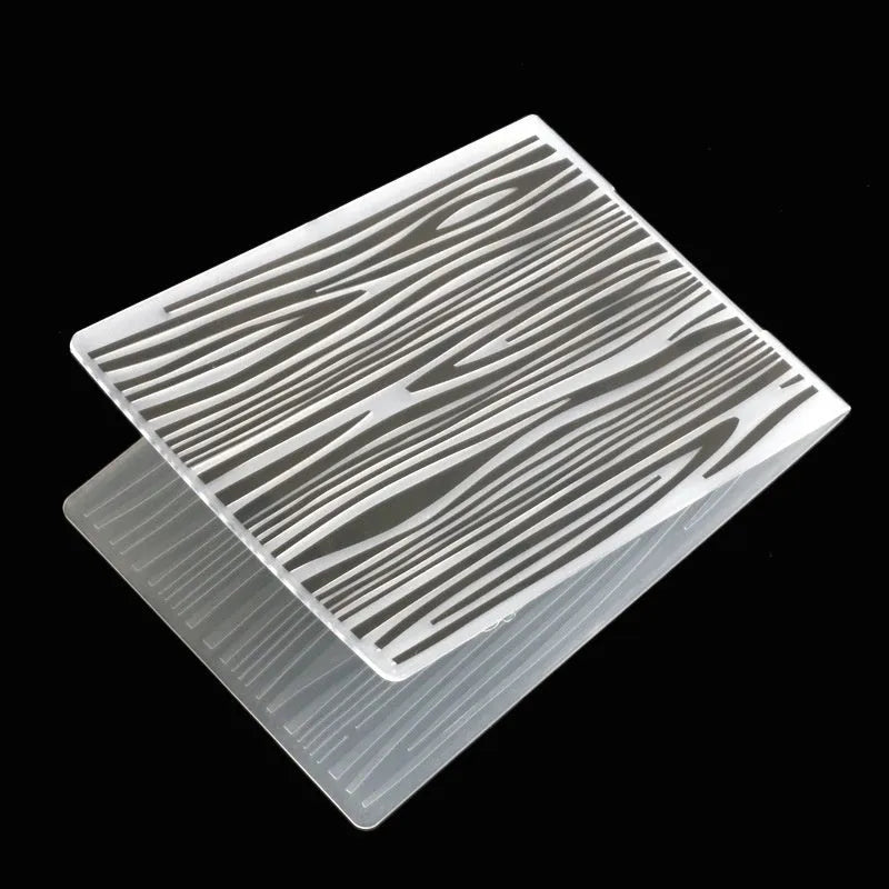 Plastic folding cake decorating mould showing windmill and five-pointed star design options
