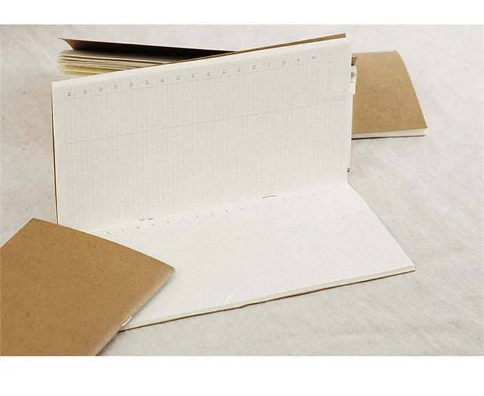 Travel cowhide diary refill notebook showing 11x21cm size and saddle stitch binding