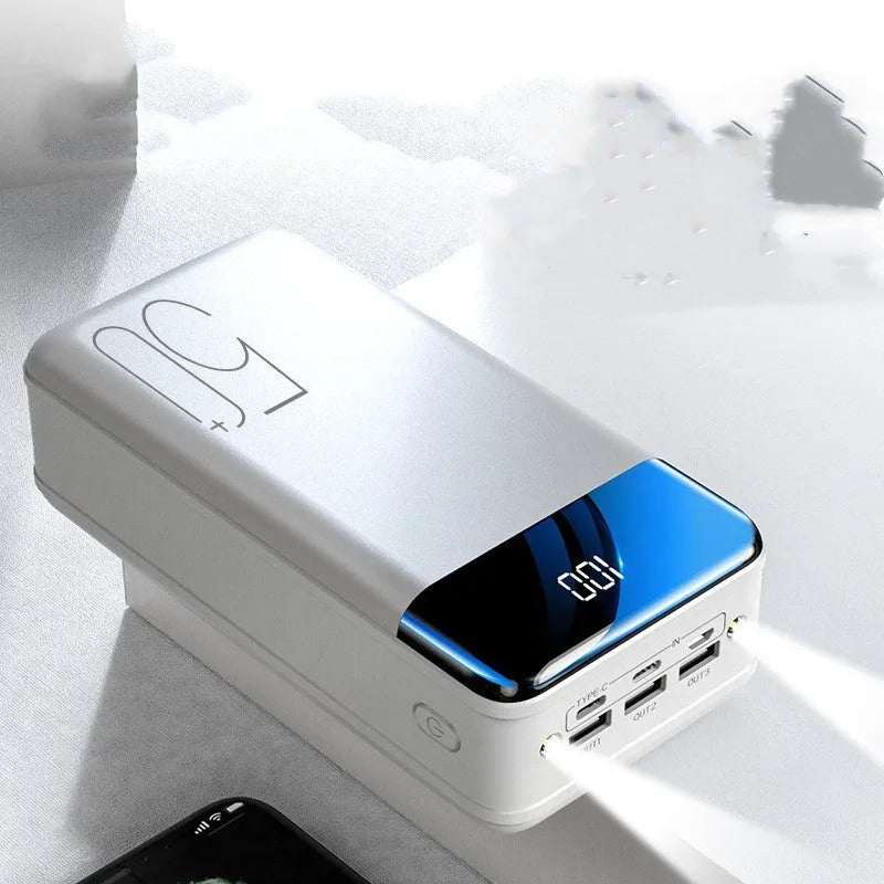 Black and white large capacity 50000mAh power bank with three USB output ports.