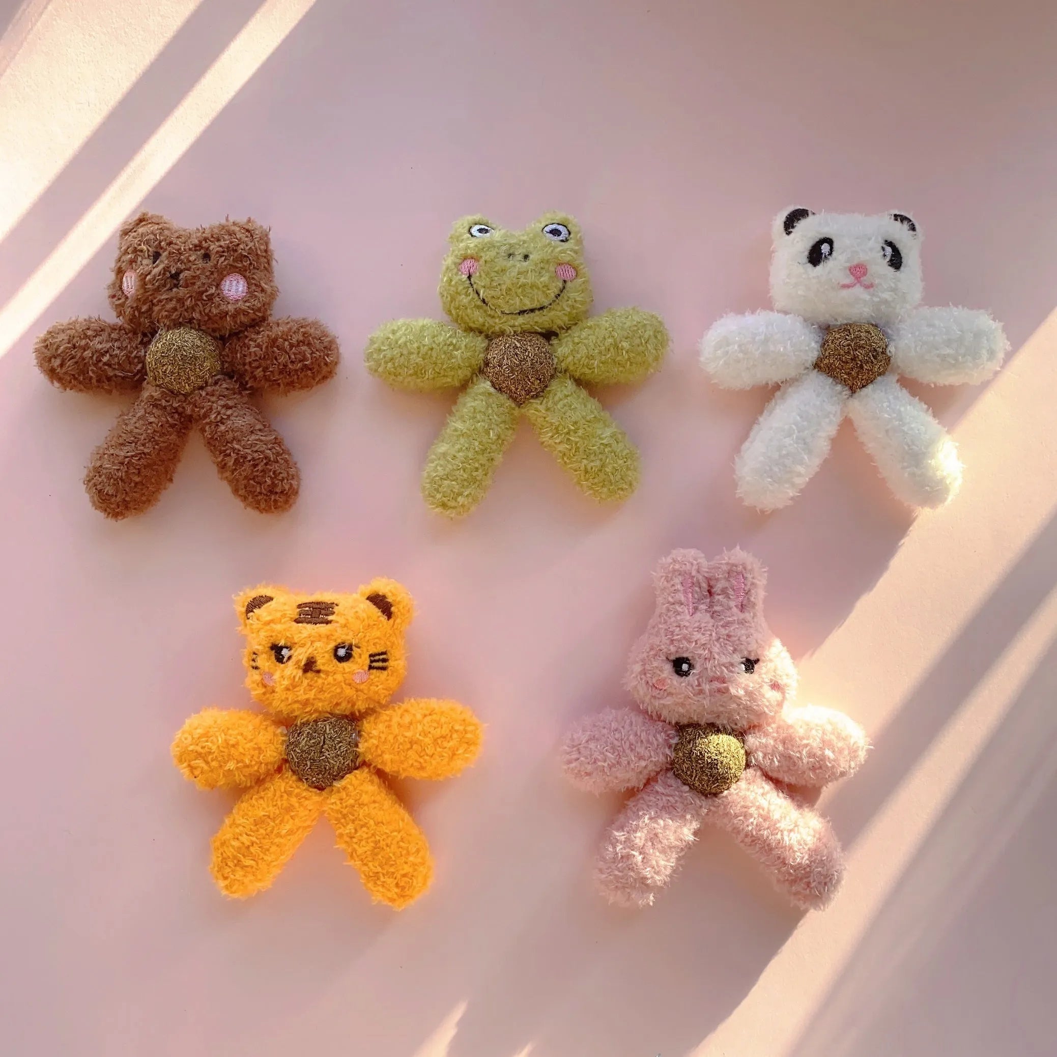 Catnip chewing ball toy for dental care in animal designs measuring 12.5cm by 11cm