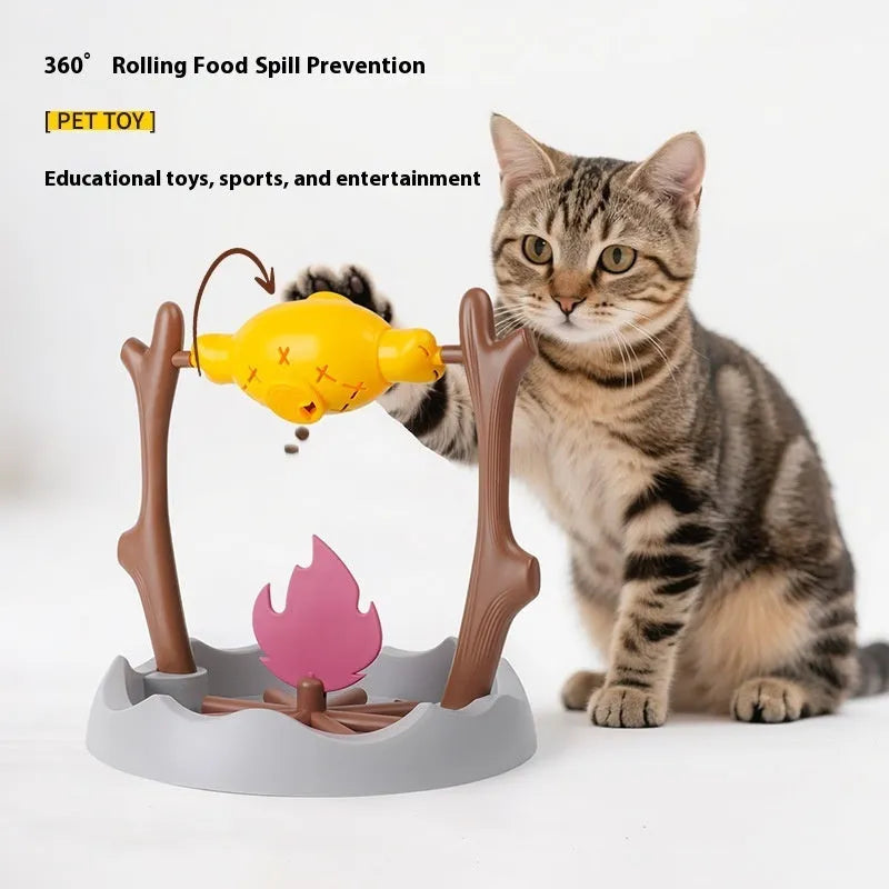 Barbecue style plastic tumbling cat food feeder toy on a white background.