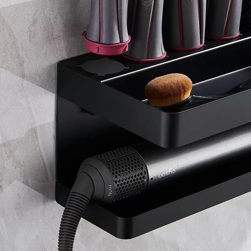 White two-layer aluminium punch-free bathroom storage rack mounted on a wall holding hair curlers.