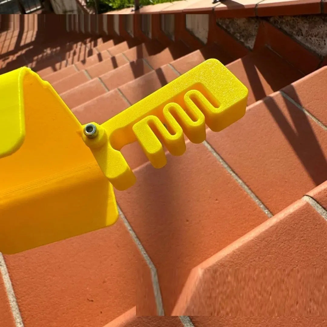 Yellow and black plastic phone clip with an attached sunshade for outdoor screen visibility.