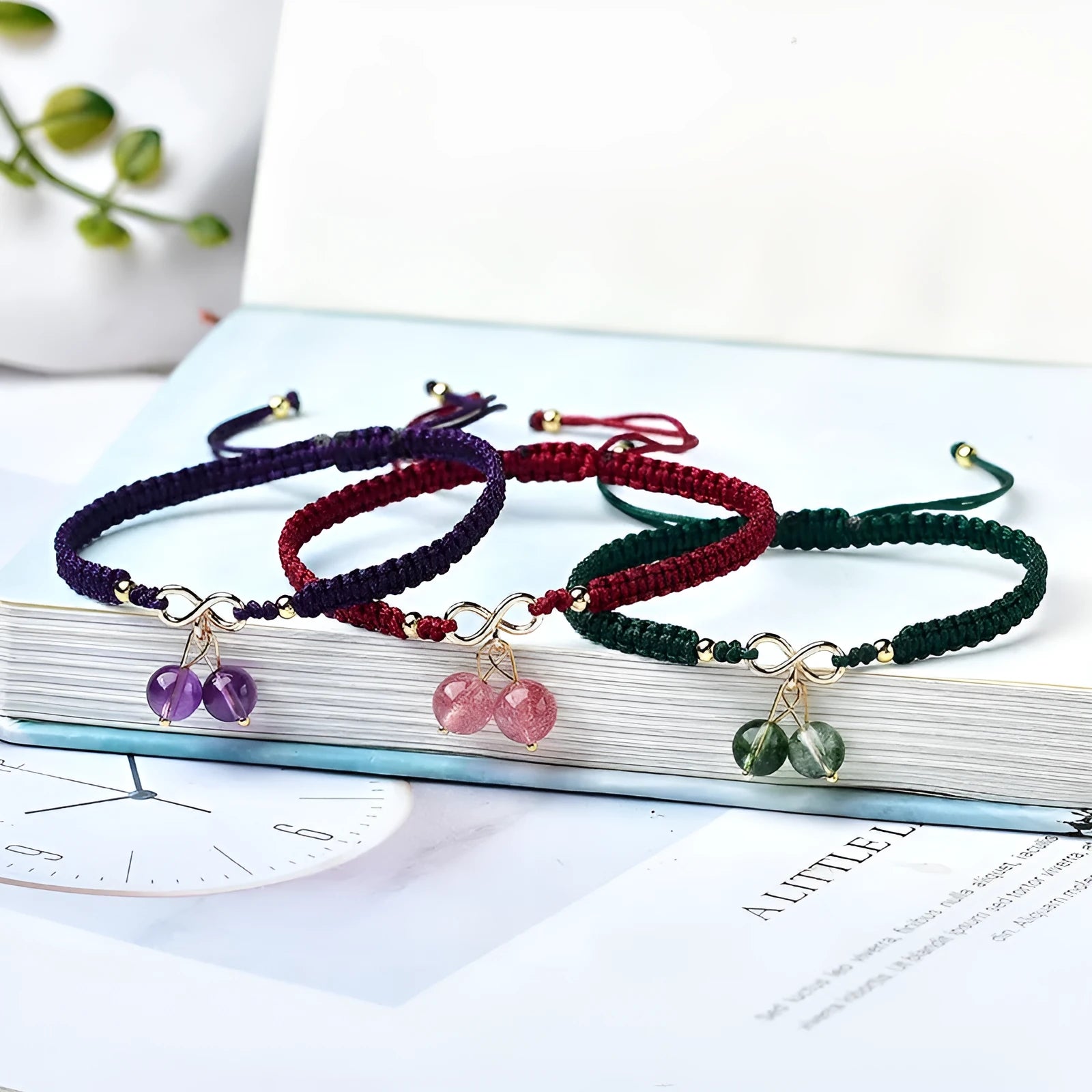 Women's bracelet with a natural strawberry-shaped crystal charm in one of three colour choices.