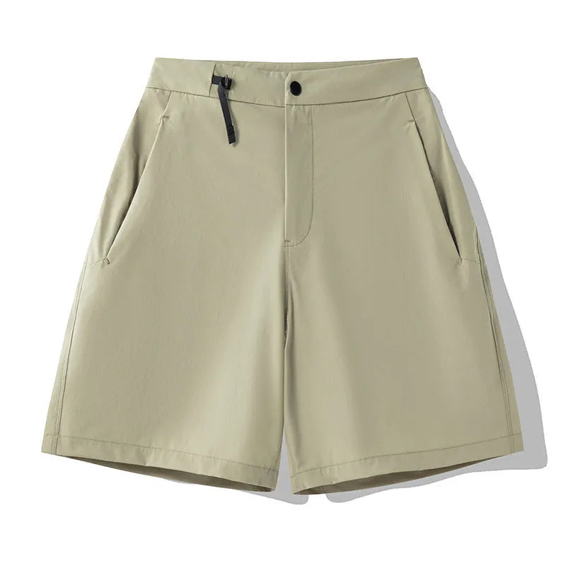 Men's quick-drying sports shorts in khaki colour with a four-sided elastic waistband, shown flat.