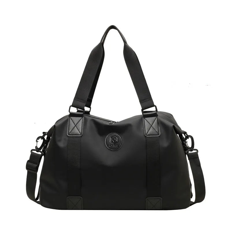 Waterproof Oxford cloth travel bag in black with 36-55 litre capacity for leisure travel