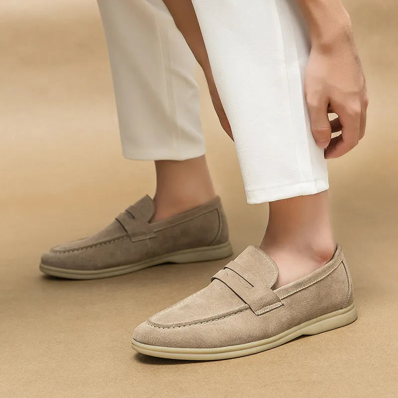 Men's black slip-on leather casual shoes with round toe and mid heel on a rubber sole.