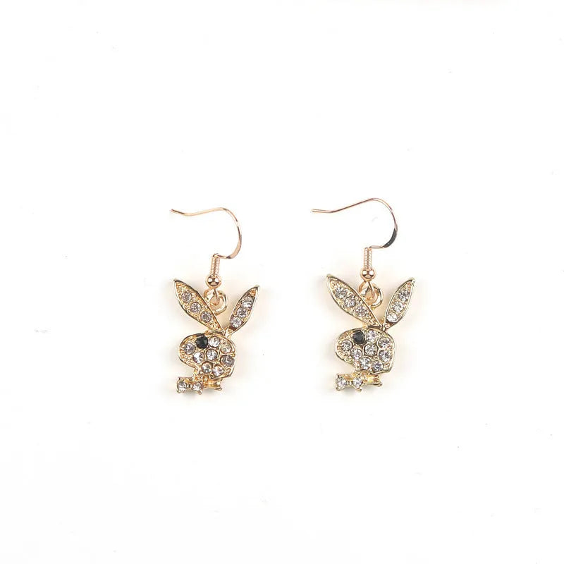 Cute cartoon rabbit stud earrings for women in gold, pink, and silver alloy.