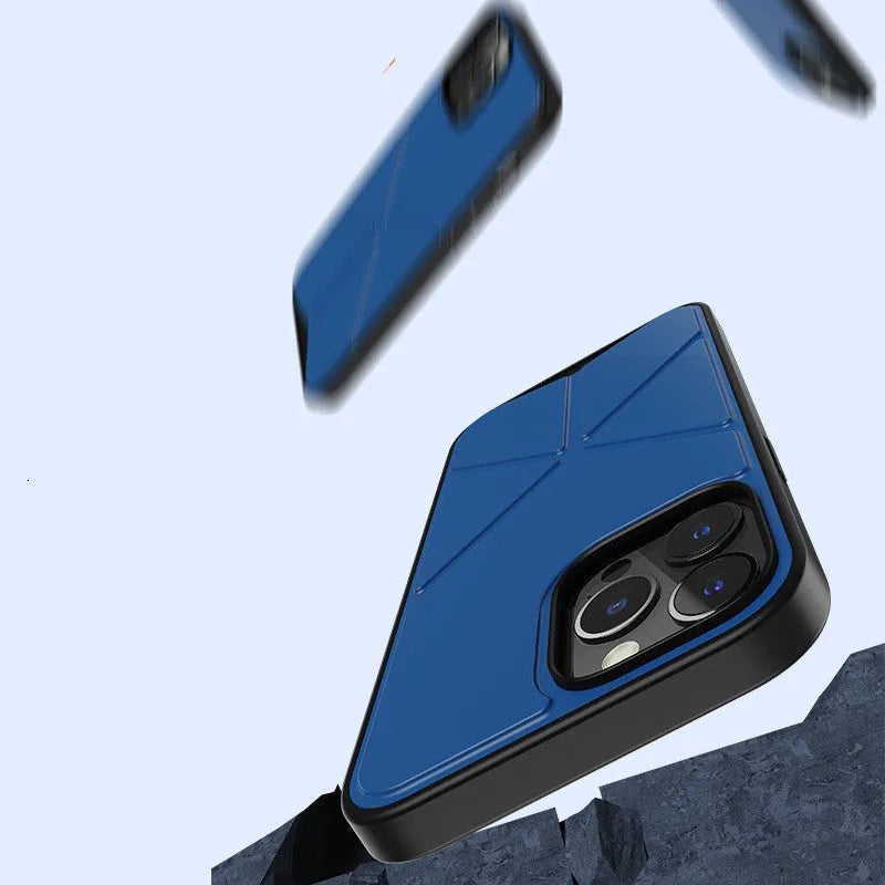 A simple black TPU back cover case for an iPhone 13 Pro Max on a grey surface.