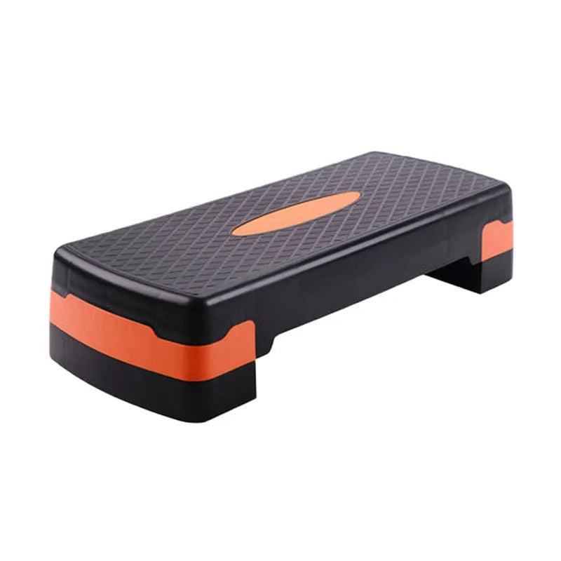 Grey Fit Step aerobics platform for fitness training on a floor.