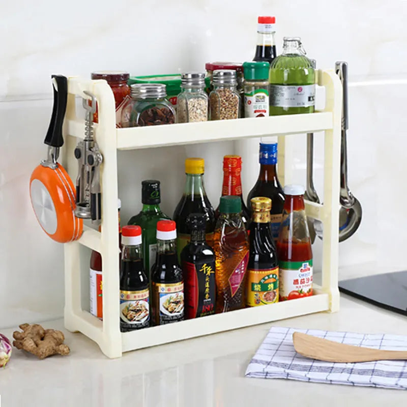 Foldable kitchen storage rack with multilayer shelves in white colour on countertop