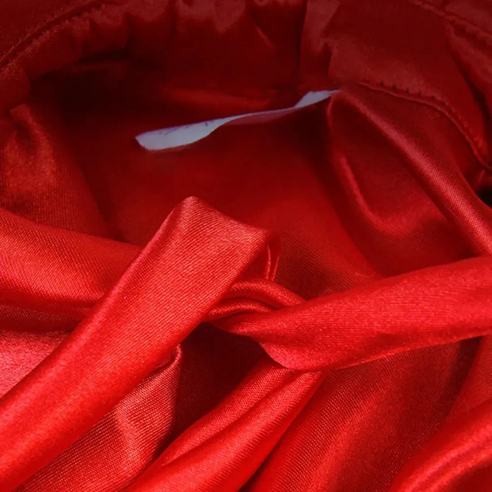 Small black vampire cloak costume on a mannequin, showing sizing for a pet.