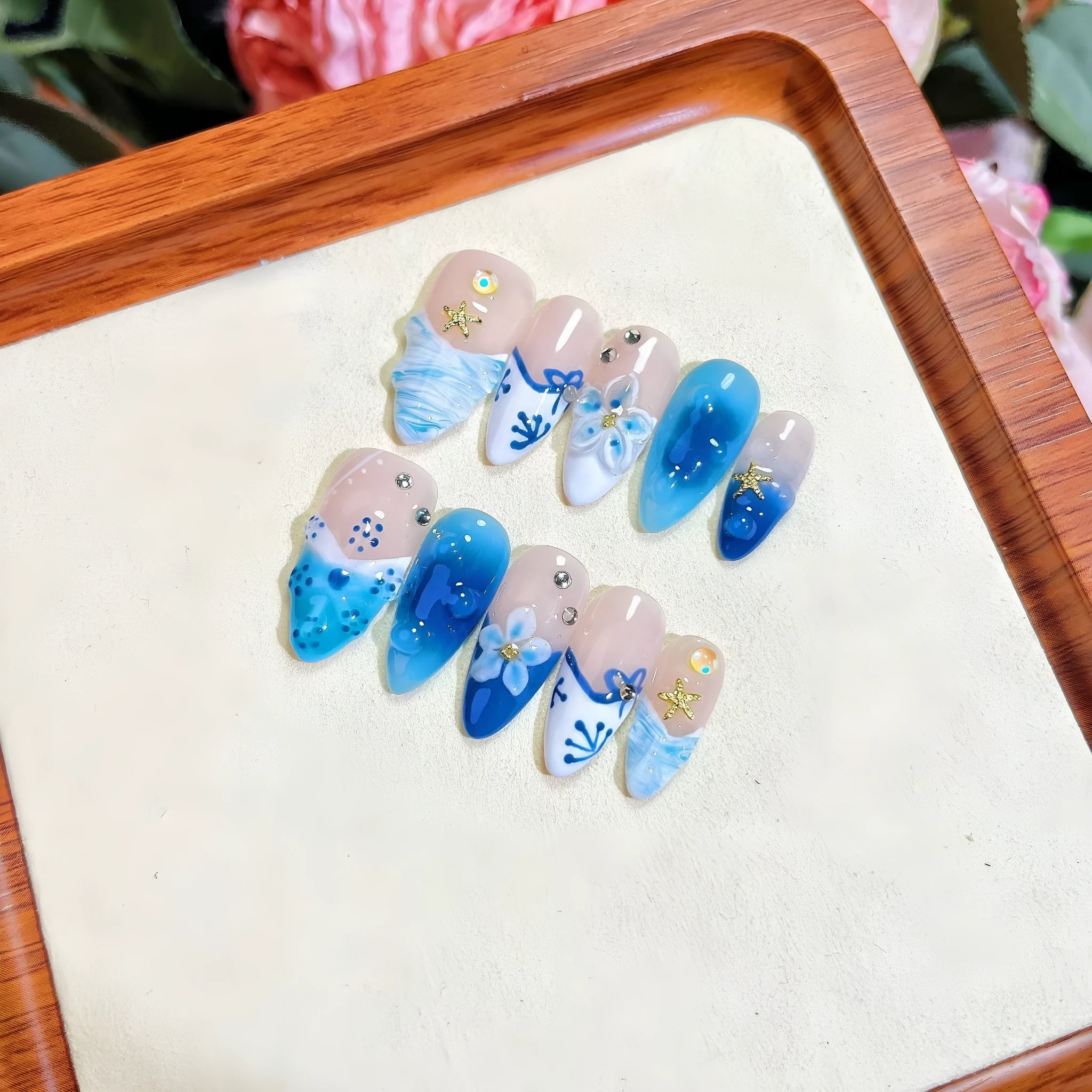 Blue hand-painted carved summer ice transparent false nails set in plastic with sizes XS S M L