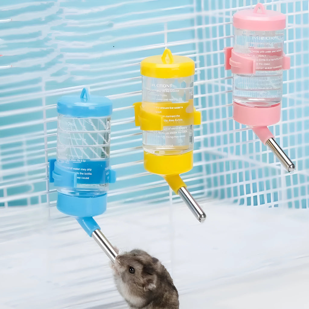 Green plastic ball kettle water feeder for small pets, showing leak-proof drinking tip.