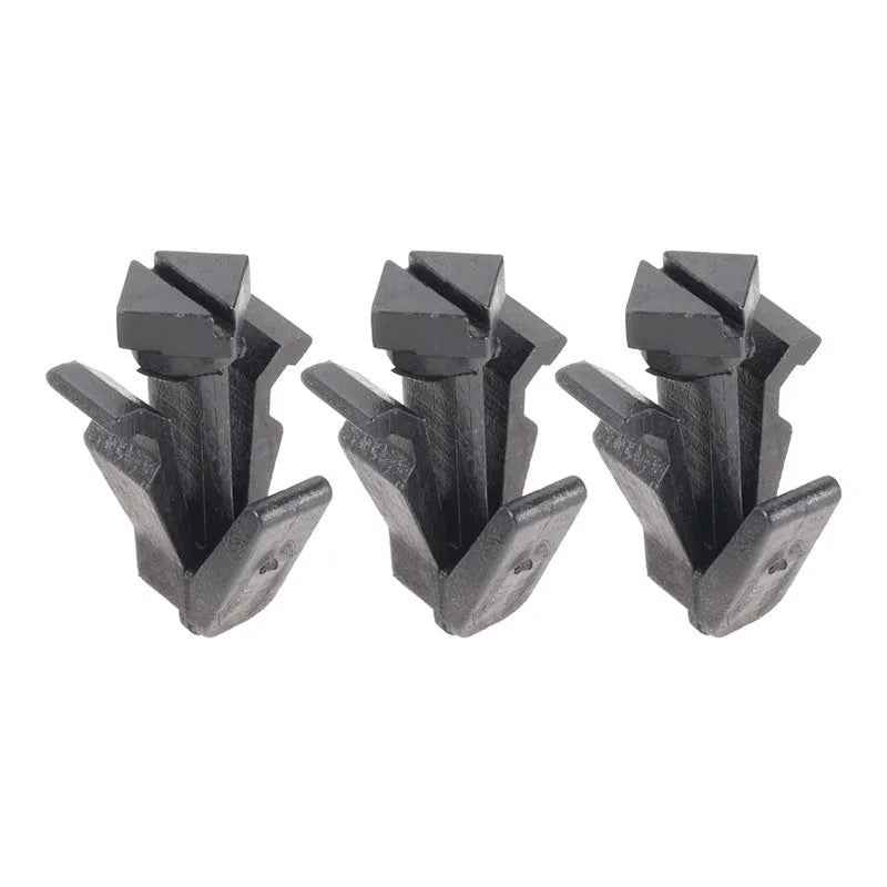 Black plastic automotive fastening clip for Nissan bumper or grille, part number 76882-0M060.