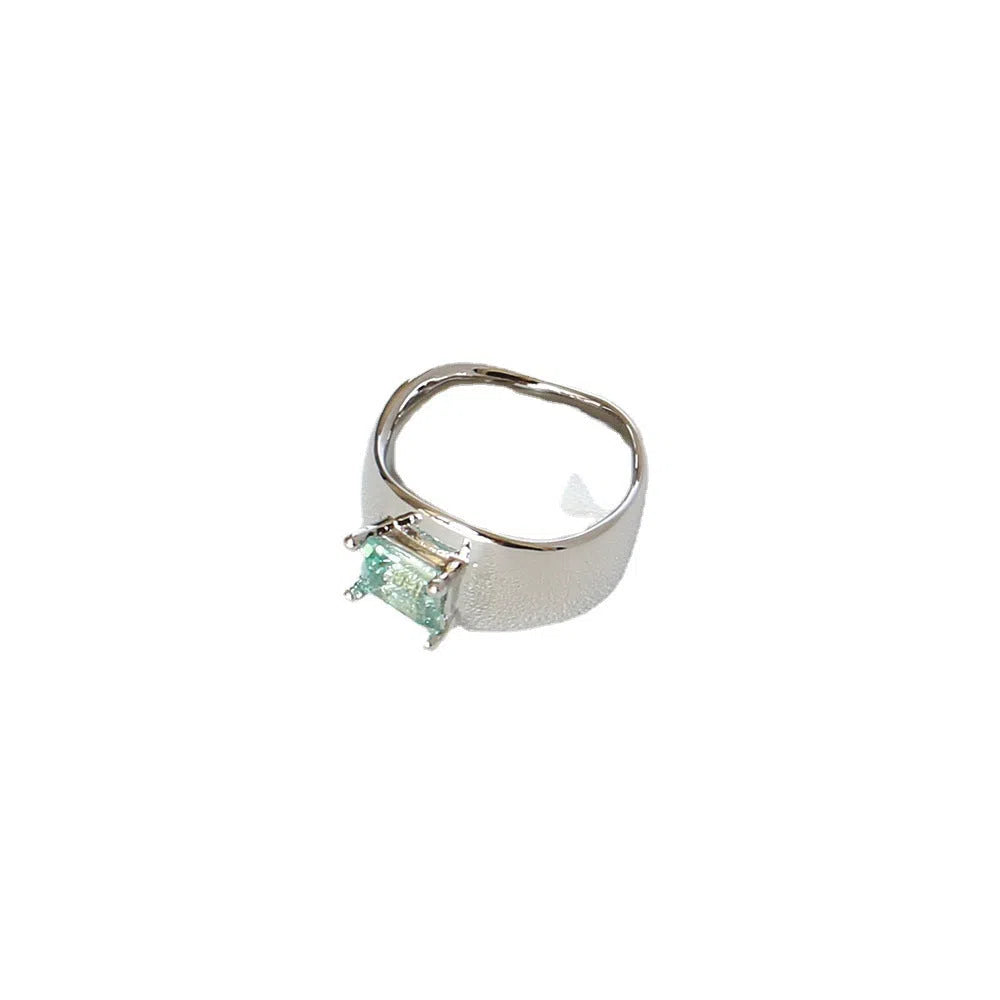 Copper platinum plated couple ring with three-ring gem design in style A on a neutral background