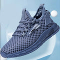 Men's beige mesh sneakers with lace-up design and low EVA sole