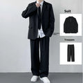 Plus size men's college style suit jacket and trousers set with white shirt and tie on hanger