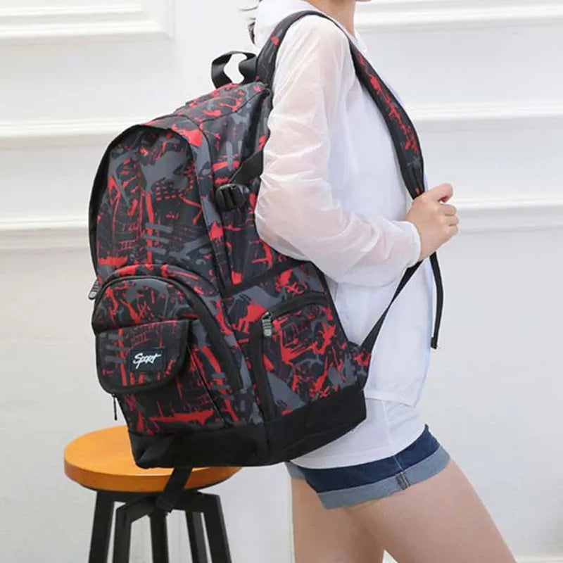 Blue classic nylon large capacity backpack shown upright, with a red colour option available.