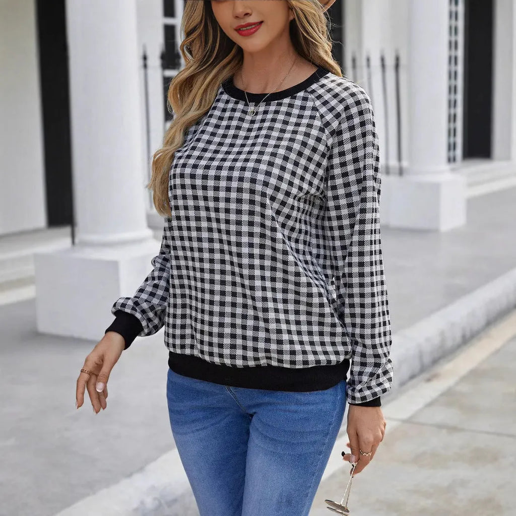 Black polyester pullover sweater with printed plaid and stripe pattern, long sleeves
