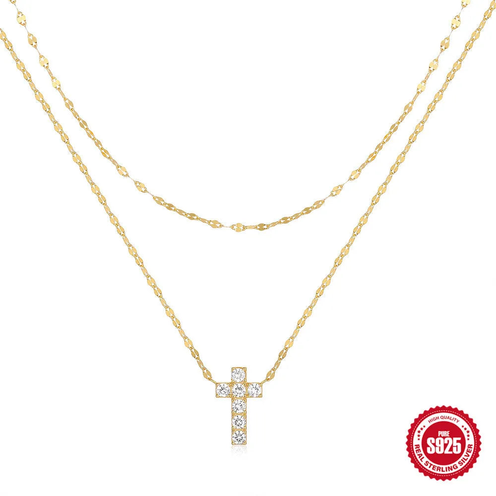 S925 sterling silver double layer geometric cross pendant necklace with twin diamond detail on a clavicle chain.