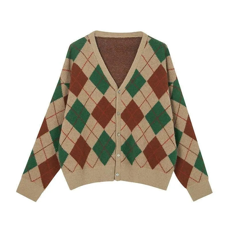 A knitted casual cardigan coat in a macaron colour, shown on a hanger with regular sleeves.