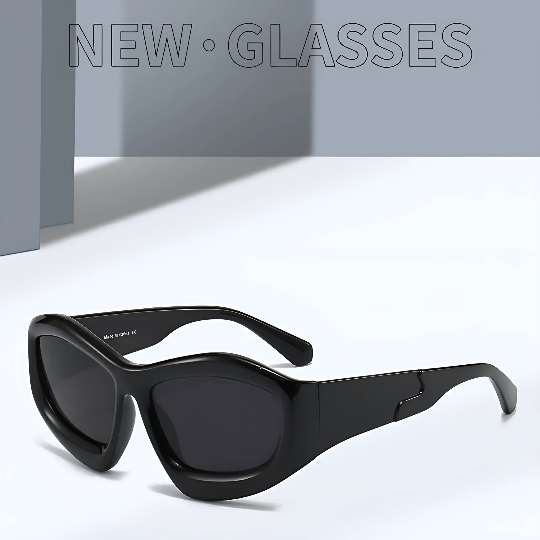 Concave bubble lens sunglasses for outdoor sports on a unisex model.
