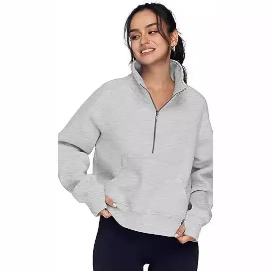 Women's loose lapel fleece-lined sweater in a solid colour showing raglan sleeve design.