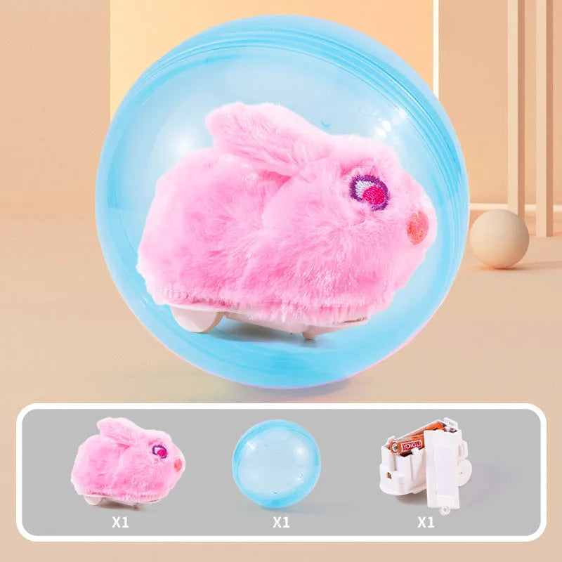 Small pet hamster rolling ball toy with transparent plastic sphere and removable plush shell.